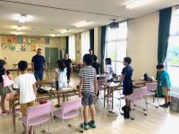 先生からの感想を聞く受講生の写真