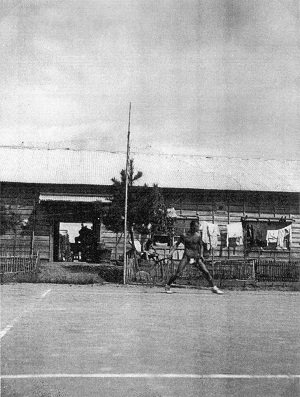 image: A prisoner playing tennis