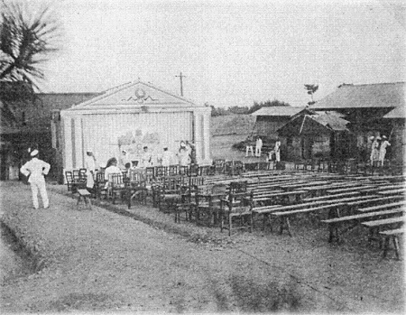 image: The stage and audience seats set outdoors 