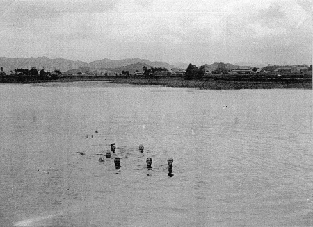image: Prisoners swimming